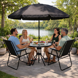 Garden dining area with four seats and parasol