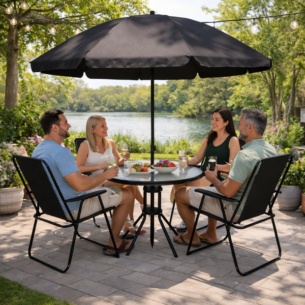 Garden dining area with four seats and parasol