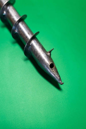 Silver metal rotary spike for outdoor setups