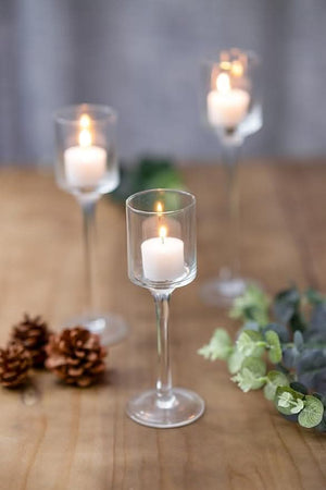 Glass candle holders in three different heights