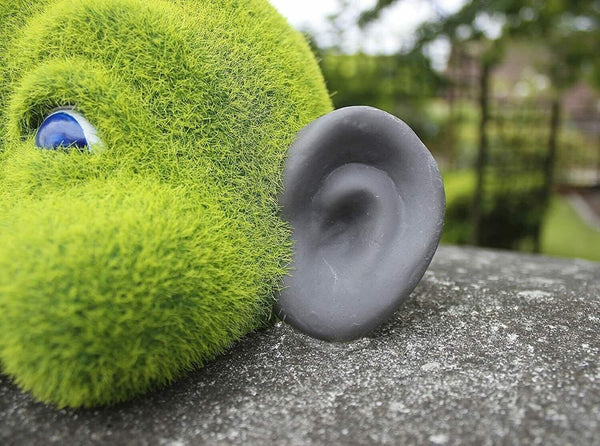 Grass effect garden head decoration shown outdoors