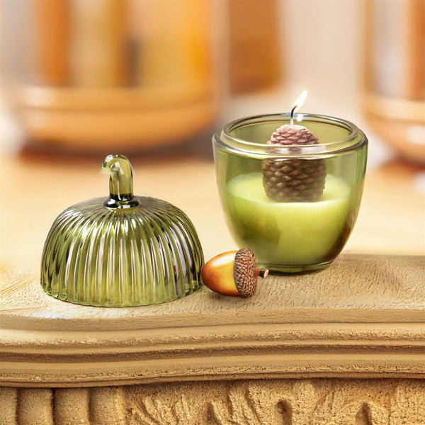 Cinnamon pumpkin candle arranged with seasonal home décor