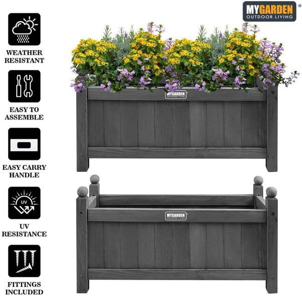 Contemporary wooden planter box with green ornamental plants.