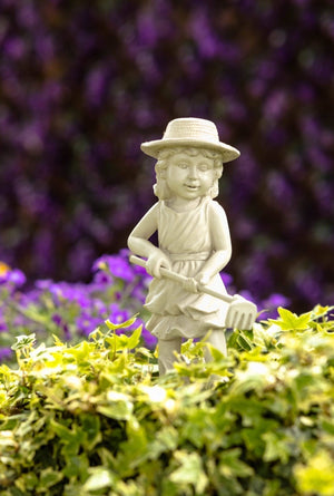 Stone effect resin statues displayed in garden