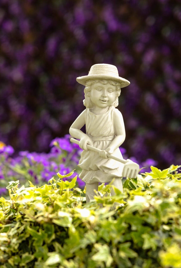 Stone effect resin statues displayed in garden