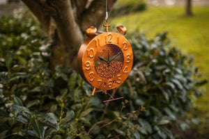 Decorative clock shaped bird feeder for wild birds
