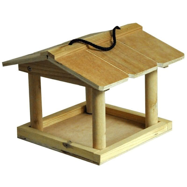 Wooden bird feeder suspended by string from tree branch