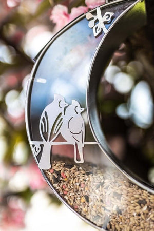 Weather resistant moon shaped bird feeder