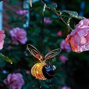 Hanging solar bee garden light with decorative metal design