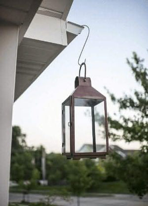 Metal S hooks hanging kitchen utensils