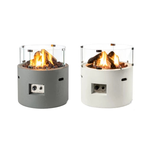 A clear glass screen kit for a round fire pit, consisting of four curved glass panels with stainless steel fixtures.