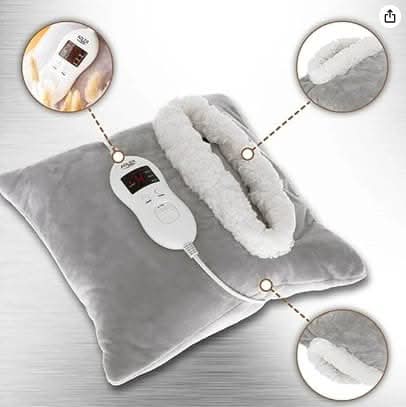 Heated pillow with built-in hand pocket