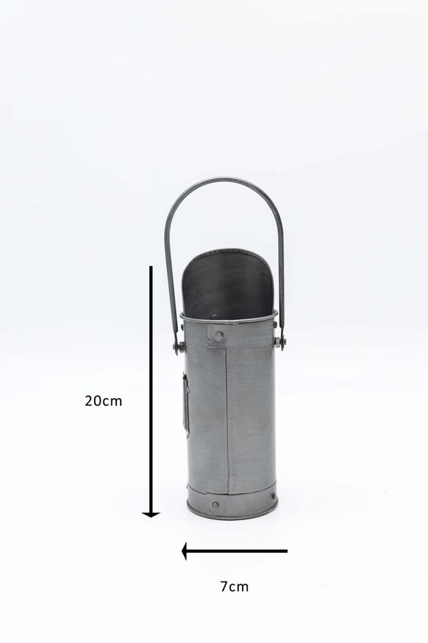 Silver metal kindling bucket shown from front