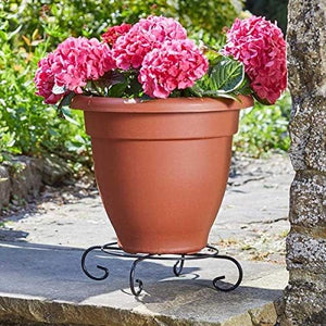 Black metal plant stand for flower pots