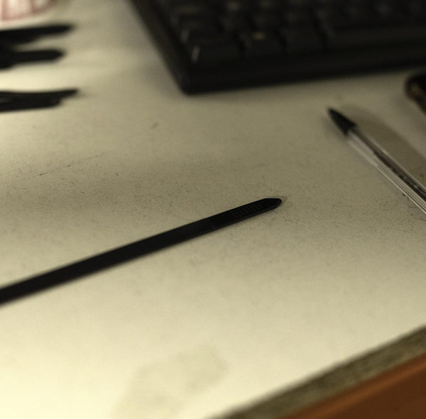 Self-locking black zip ties close up