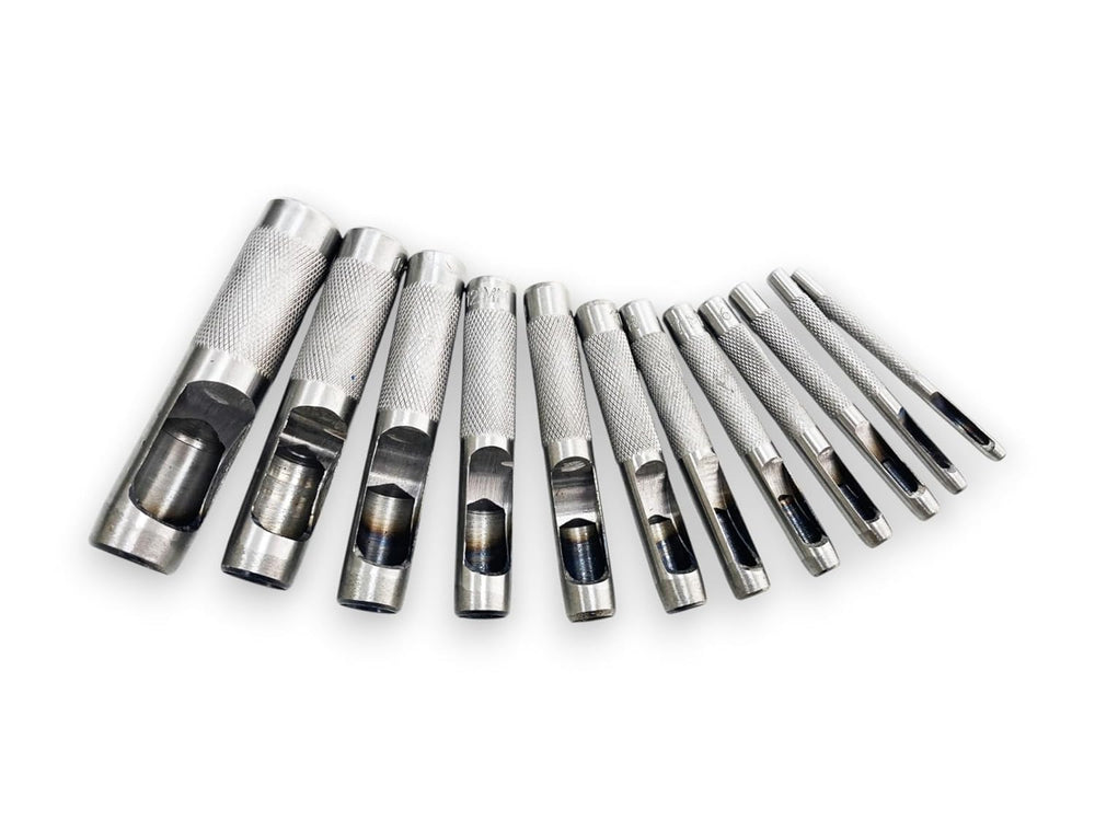 Twelve-piece hollow hole punch set in assorted sizes.