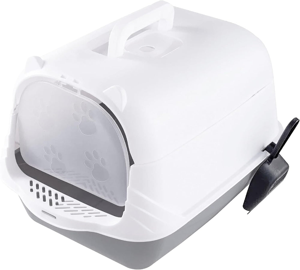 A white and gray automatic cat litter box with a transparent front door and a black wireless sensor, shown on a tiled floor next to a cat in a bright, modern room.