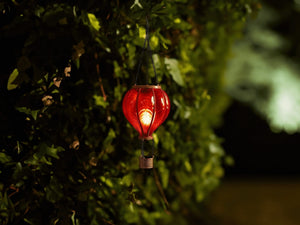 Solar powered balloon lantern displayed outdoors