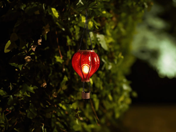 Solar powered balloon lantern displayed outdoors