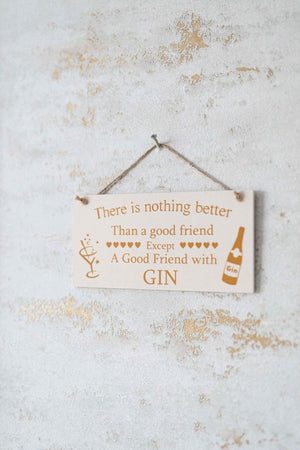 Decorative friendship sign displayed beside a bottle
