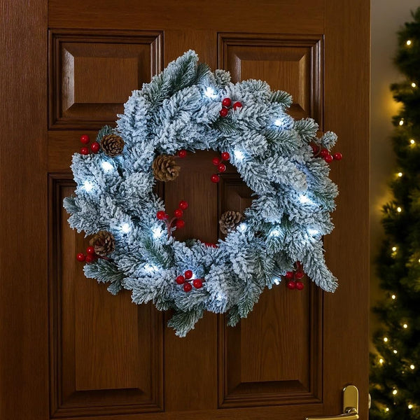 Pre lit Christmas wreath with pinecones.