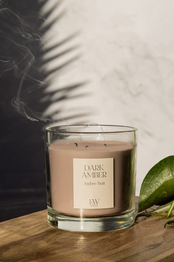 Dark Amber candle styled on a dining table