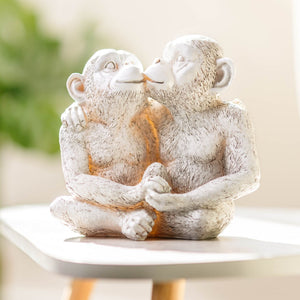 Kissing monkeys garden ornament made from resin