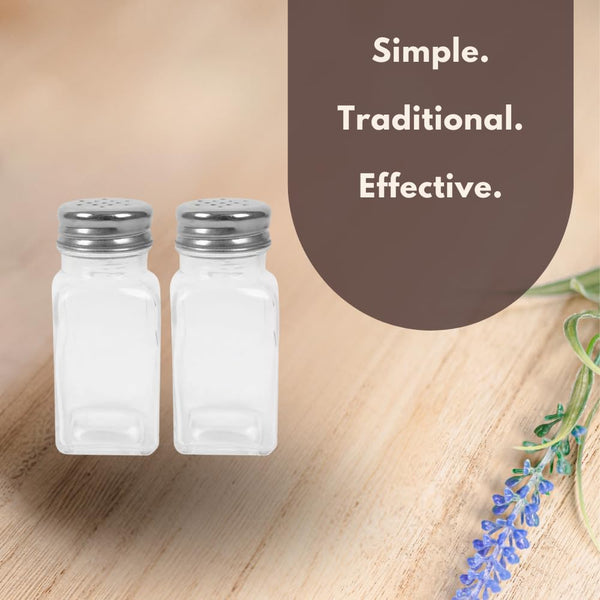 Clear seasoning pots filled with salt and pepper