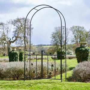 Large black metal garden arch for climbing plants