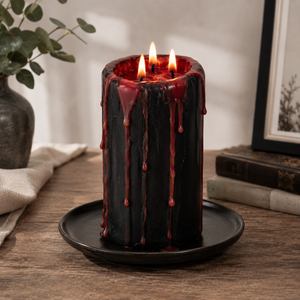Large vampire pillar candle with realistic bleeding wax effect