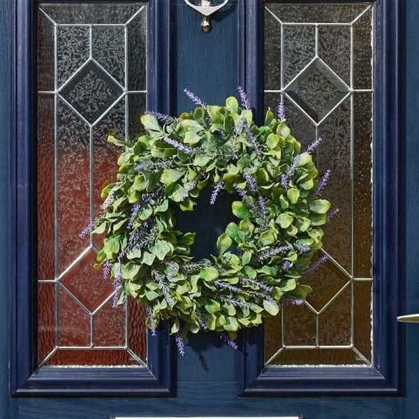 Lavender whirl garden ornament with artificial foliage