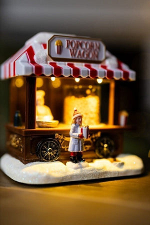 light-up-christmas-village-scene-popcorn-wagon