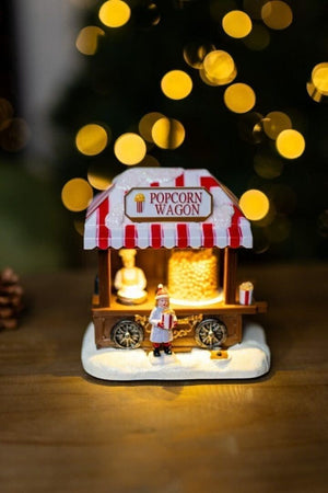 light-up-christmas-village-scene-popcorn-wagon