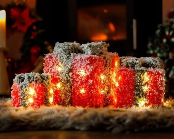 Red and green Christmas presents with frosted finish