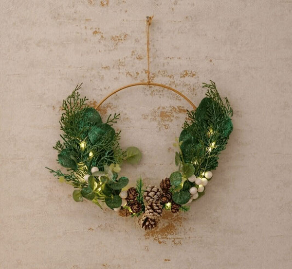 Artificial greenery arrangement displayed on a front door