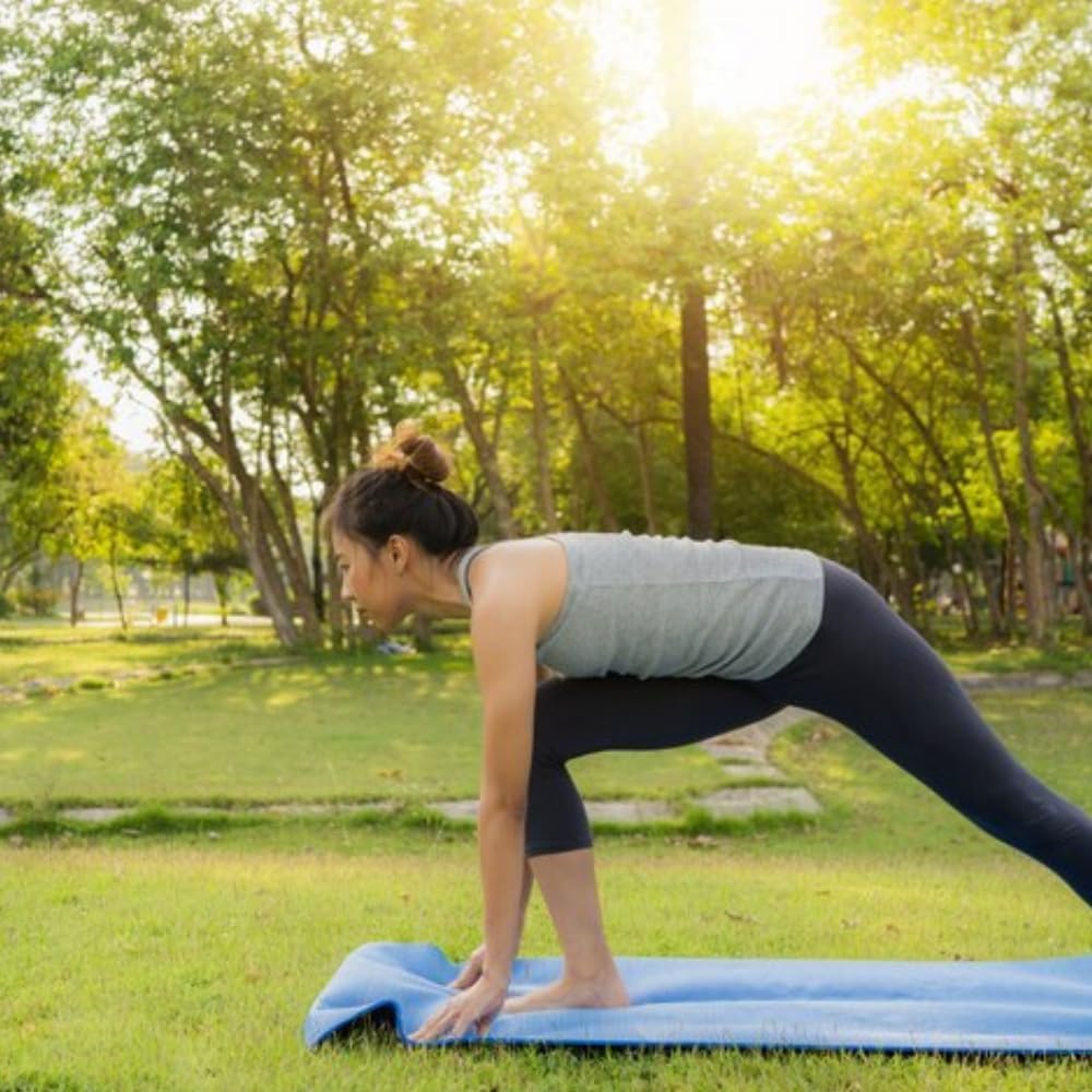Blue waterproof foam yoga mat rolled up