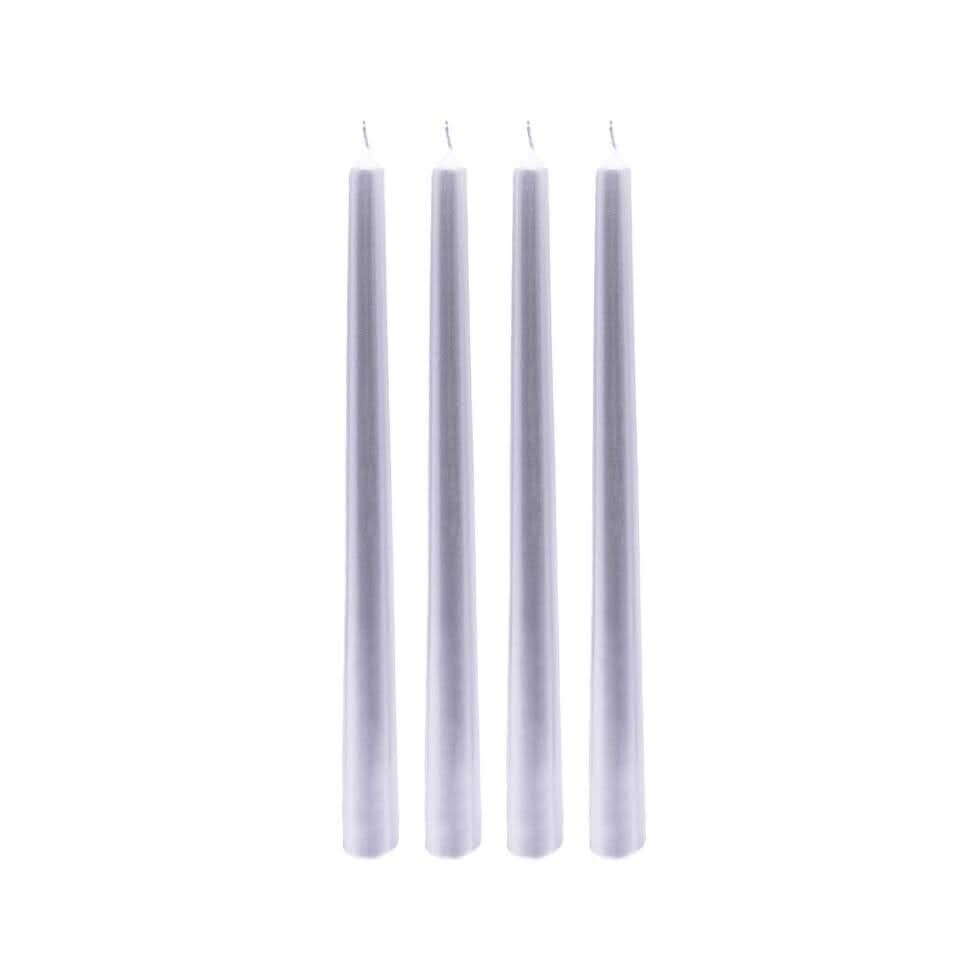 Silver candle holder with five lit candles on a wooden surface.