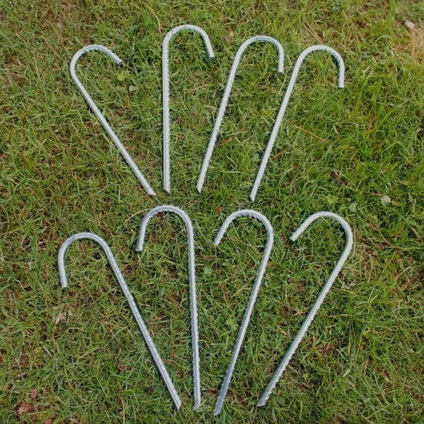 Metal anchors used around a garden structure