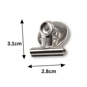 Magnetic bulldog clip attached to fridge