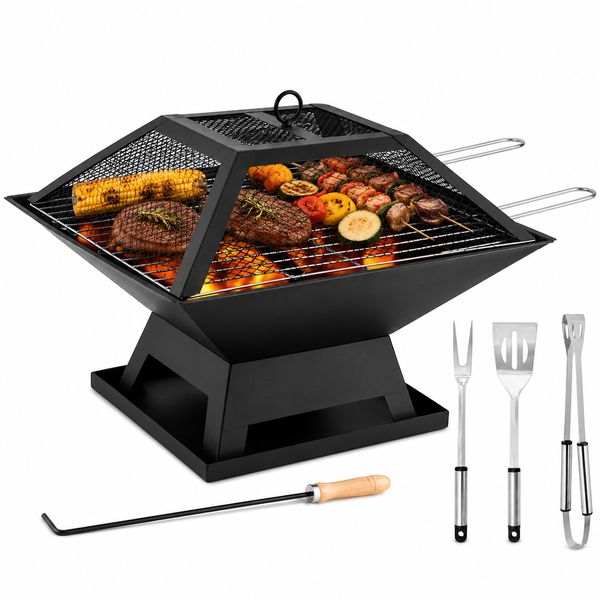 Black portable grill with food and grilling tools on a white background