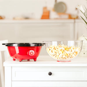 Electric popcorn maker used for a family movie night
