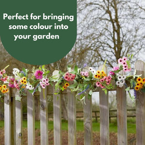Artificial floral garland adding colour to garden space