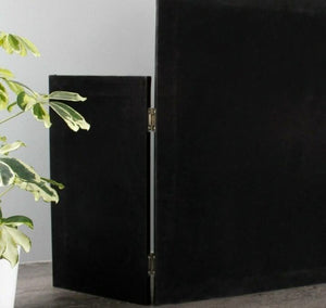Freestanding mirror positioned on a dressing table