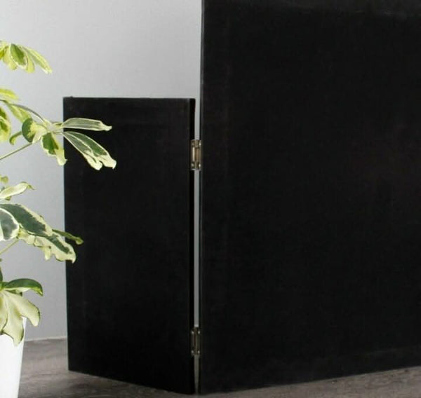 Freestanding mirror positioned on a dressing table