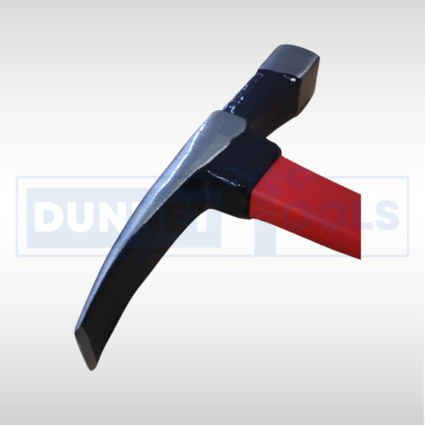 Fibreglass handled masonry hammer for stone chipping tasks.