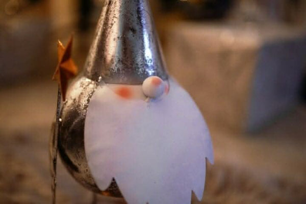Two freestanding festive gonk decorations shown together