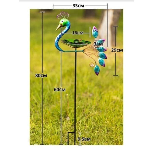 Metal bird feeder with decorative peacock design