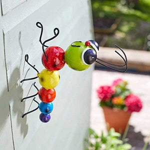 Hand-painted metal caterpillar garden wall art
