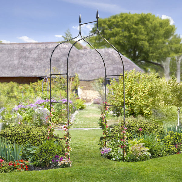 Heavy duty garden arch positioned at entrance