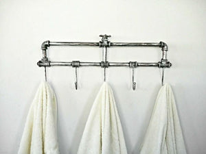 Decorative pipe coat hanger with valve detail
